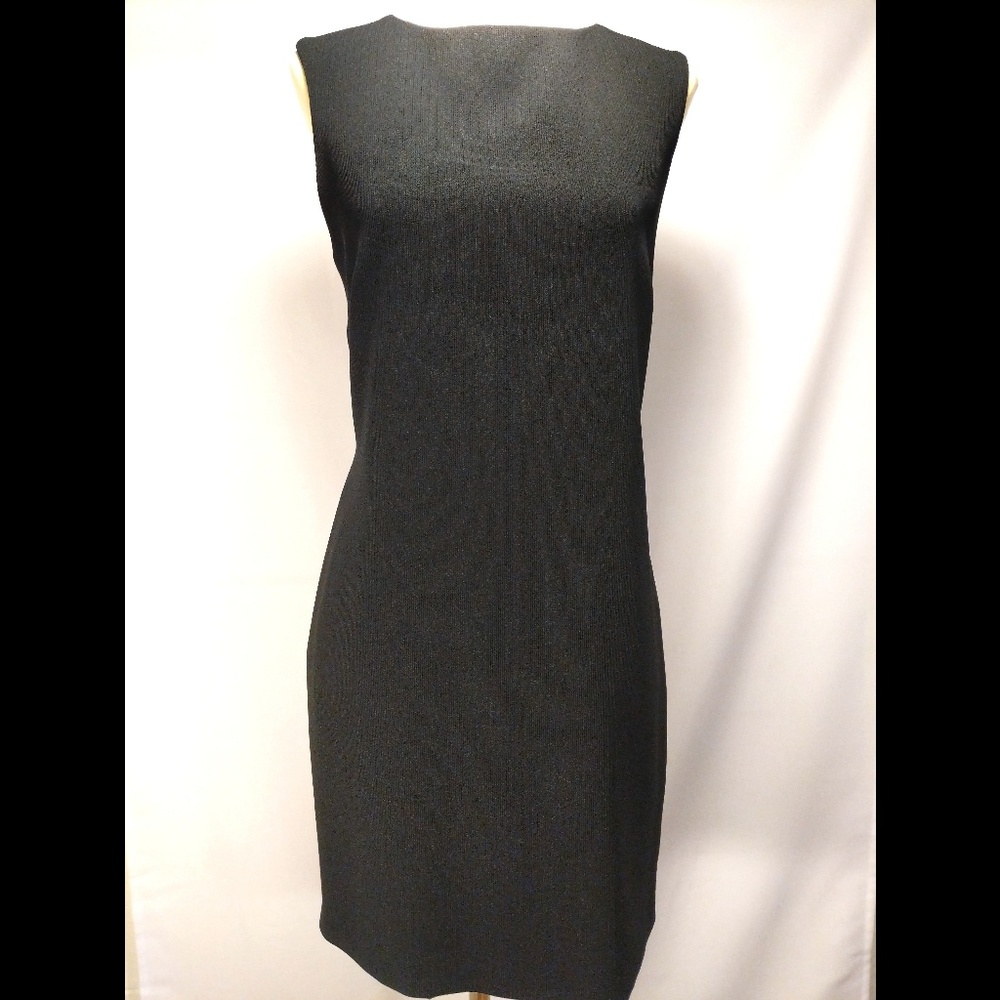 Classic black dress by Bebe, size 6